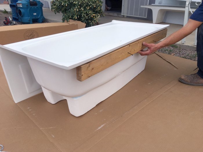 Attaching 2x4 to bathtub